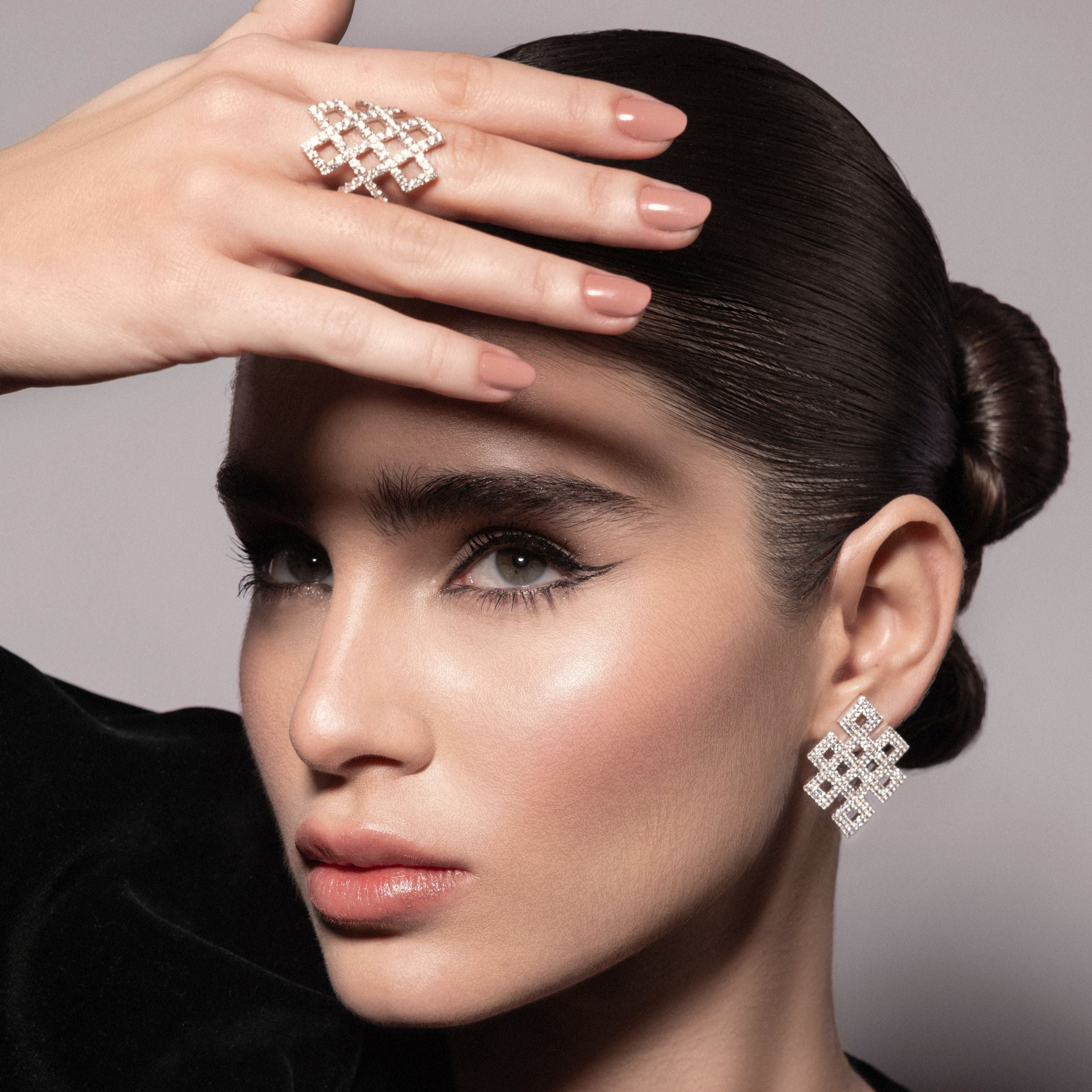 Model wearing Power Knot -handcrafted jewelry in gold and diamonds-Josette Leon