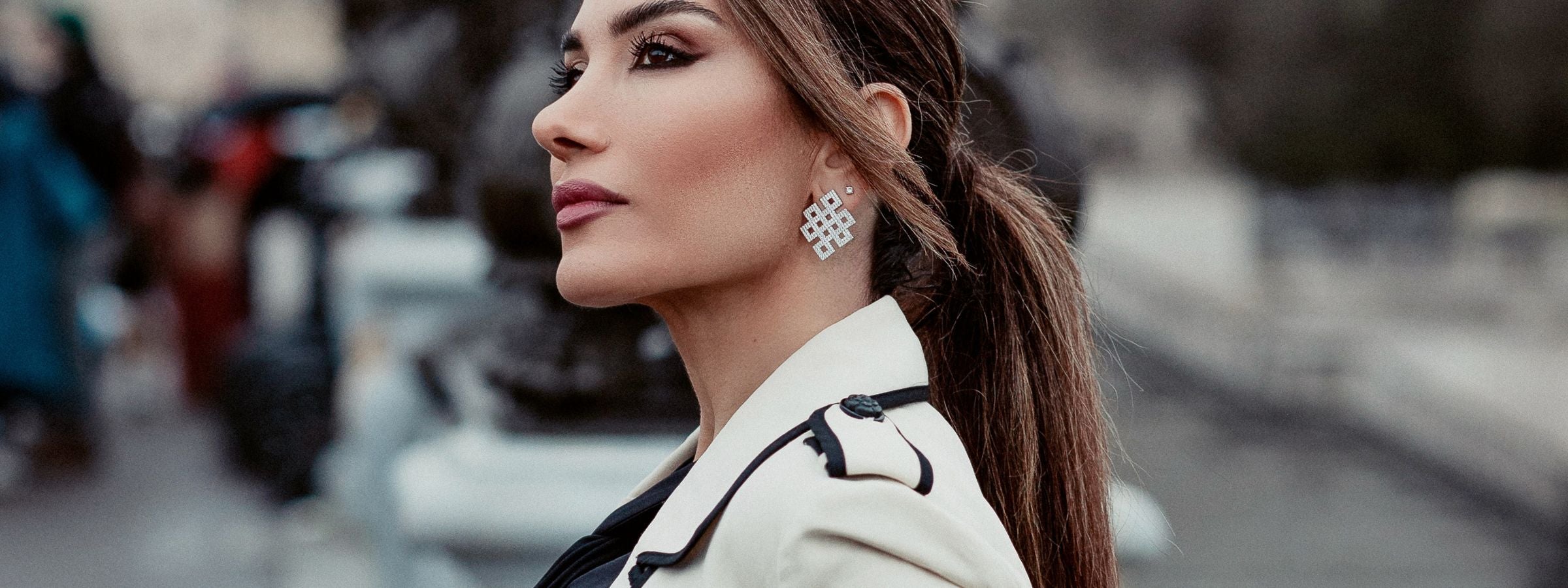 Josette Leon posing wearing handcrafted jewelry