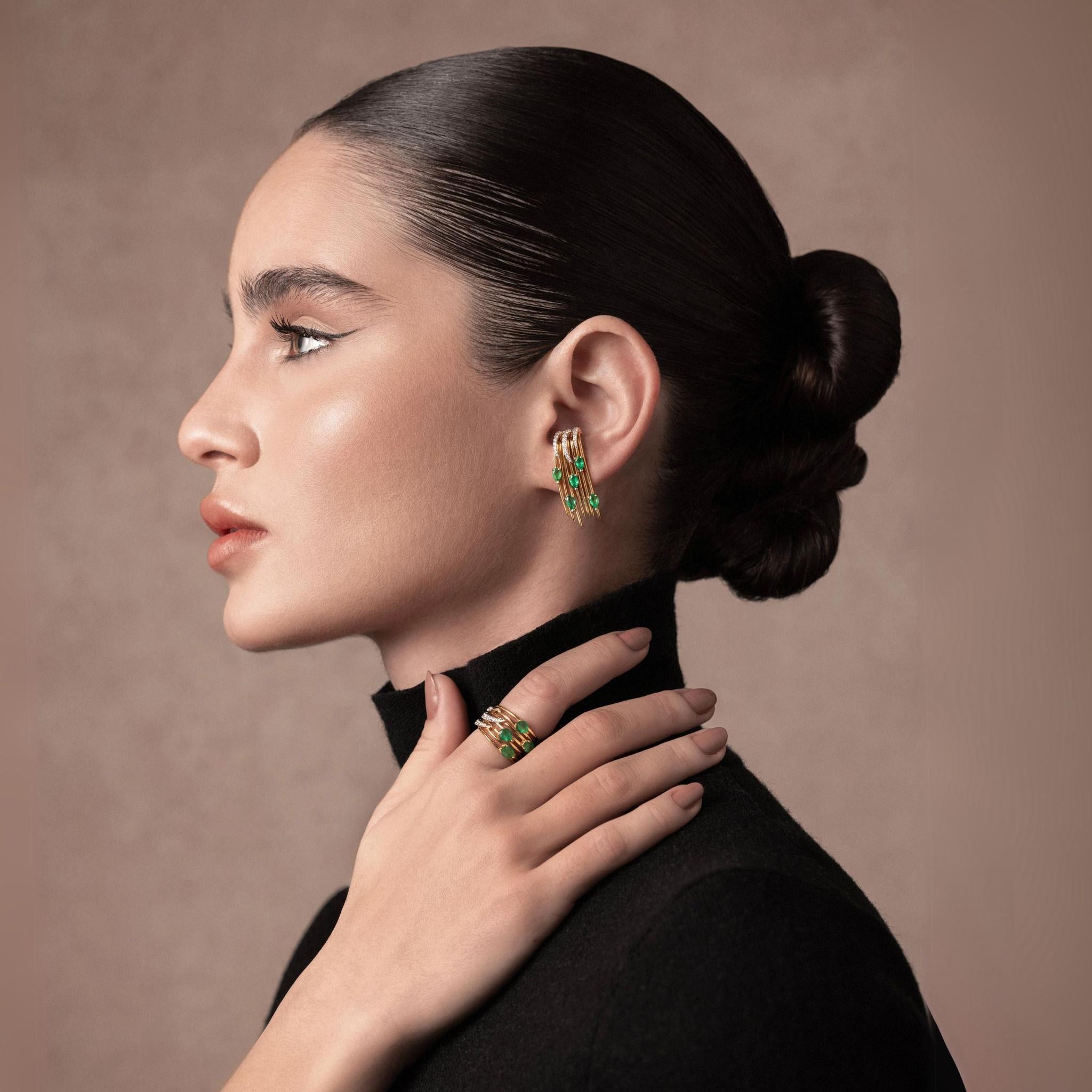Model wearing Peacock Small Ear Cuff