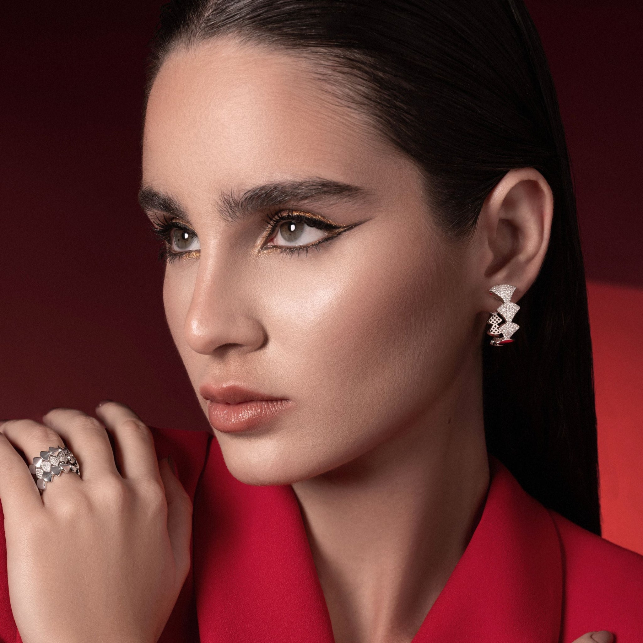 Model wearing Reborn handcrafted jewelry in gold and diamonds-Josette Leon