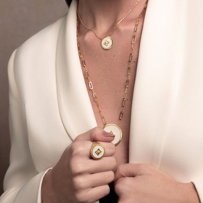 Model wearing Stellar handcrafted jewelry in gold and diamonds -Josette Leon